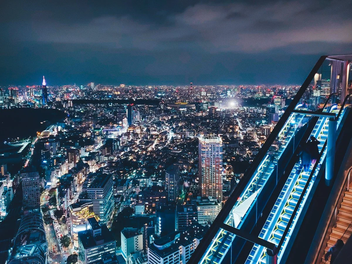The open-air rooftop observation deck of Shibuya Sky with a breathtaking view of Tokyo.