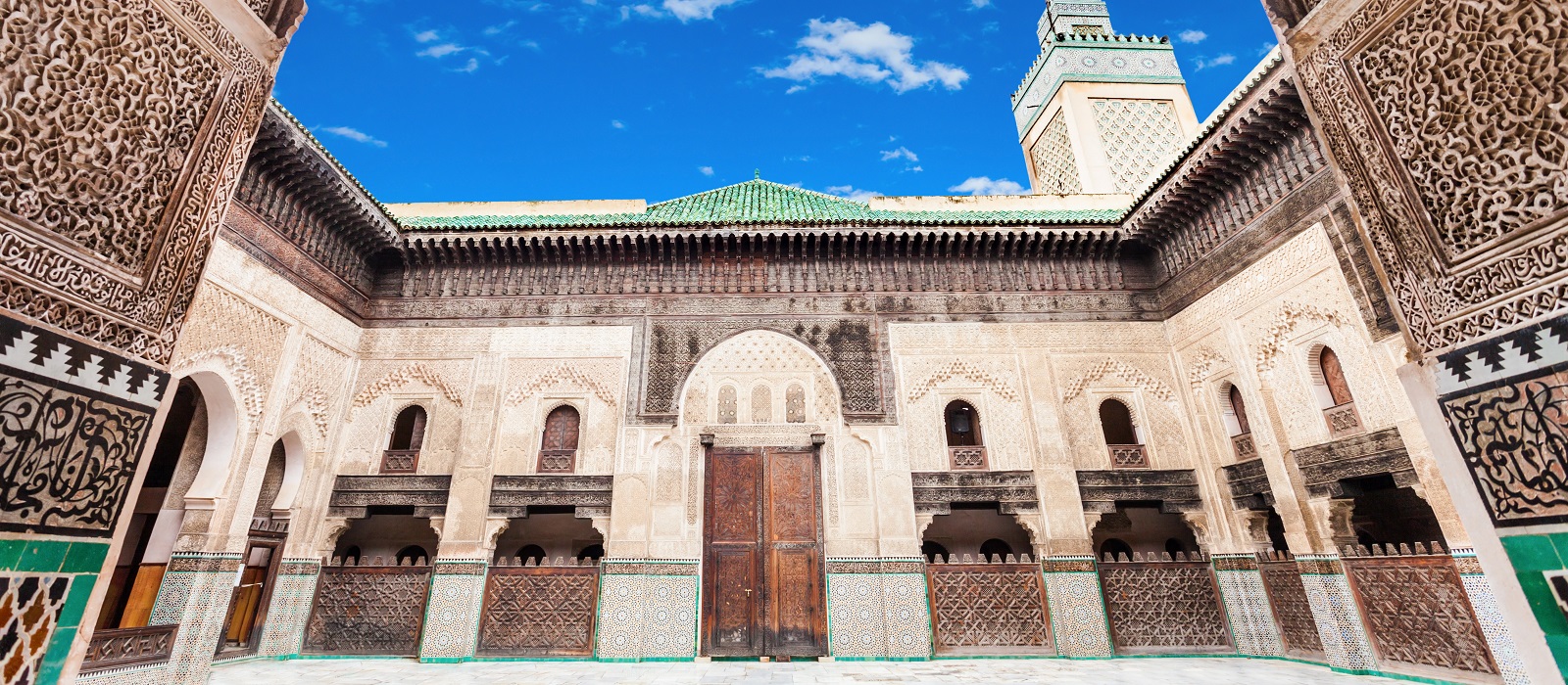 The intricate architecture of the Bou Inania Madrasa in Fes.