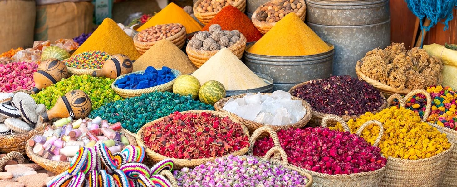 A vibrant stall selling colorful spices in Rahba Kedima (Spice Square).