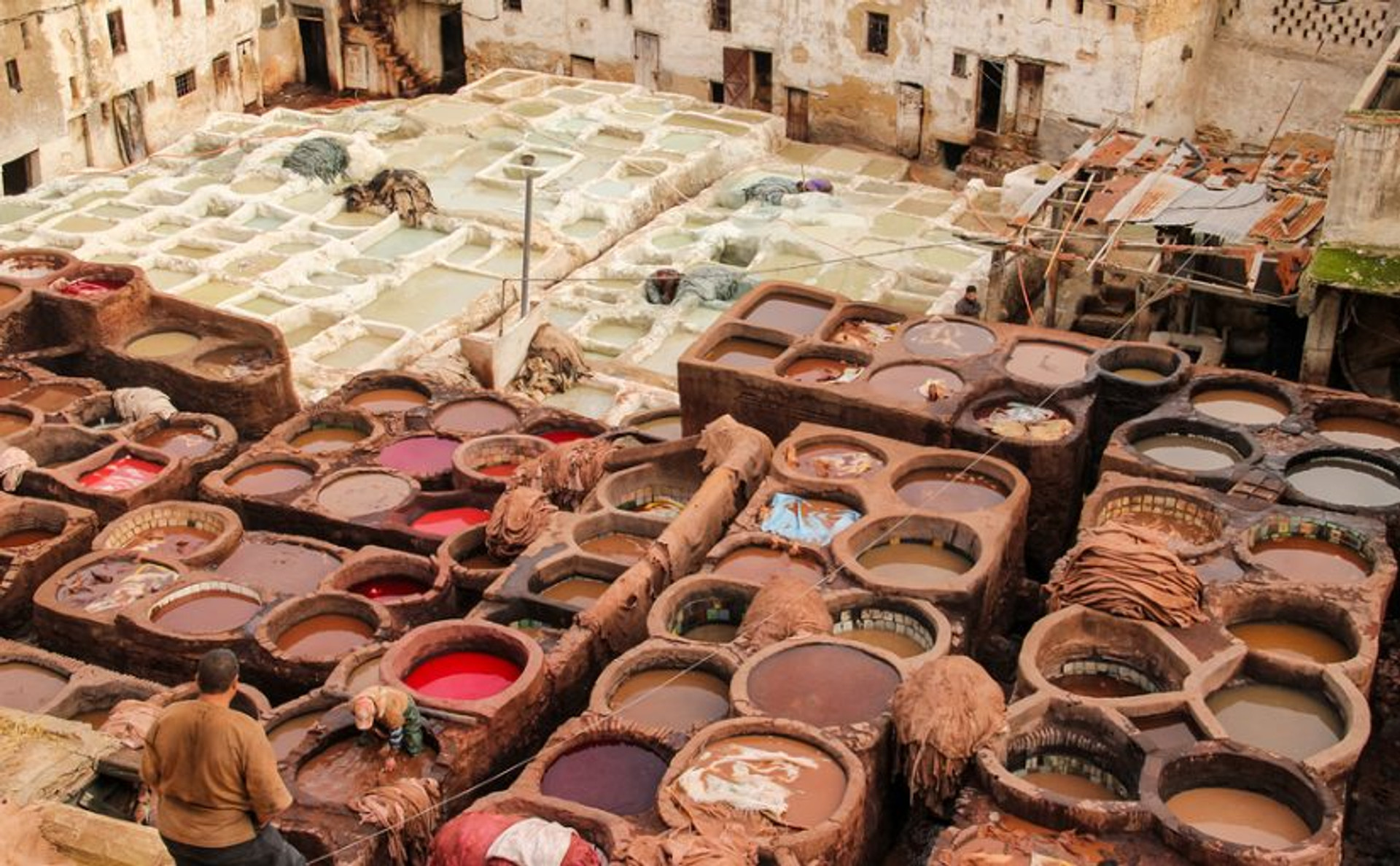 The iconic, colorful vats of the Chouara Tannery in Fes.