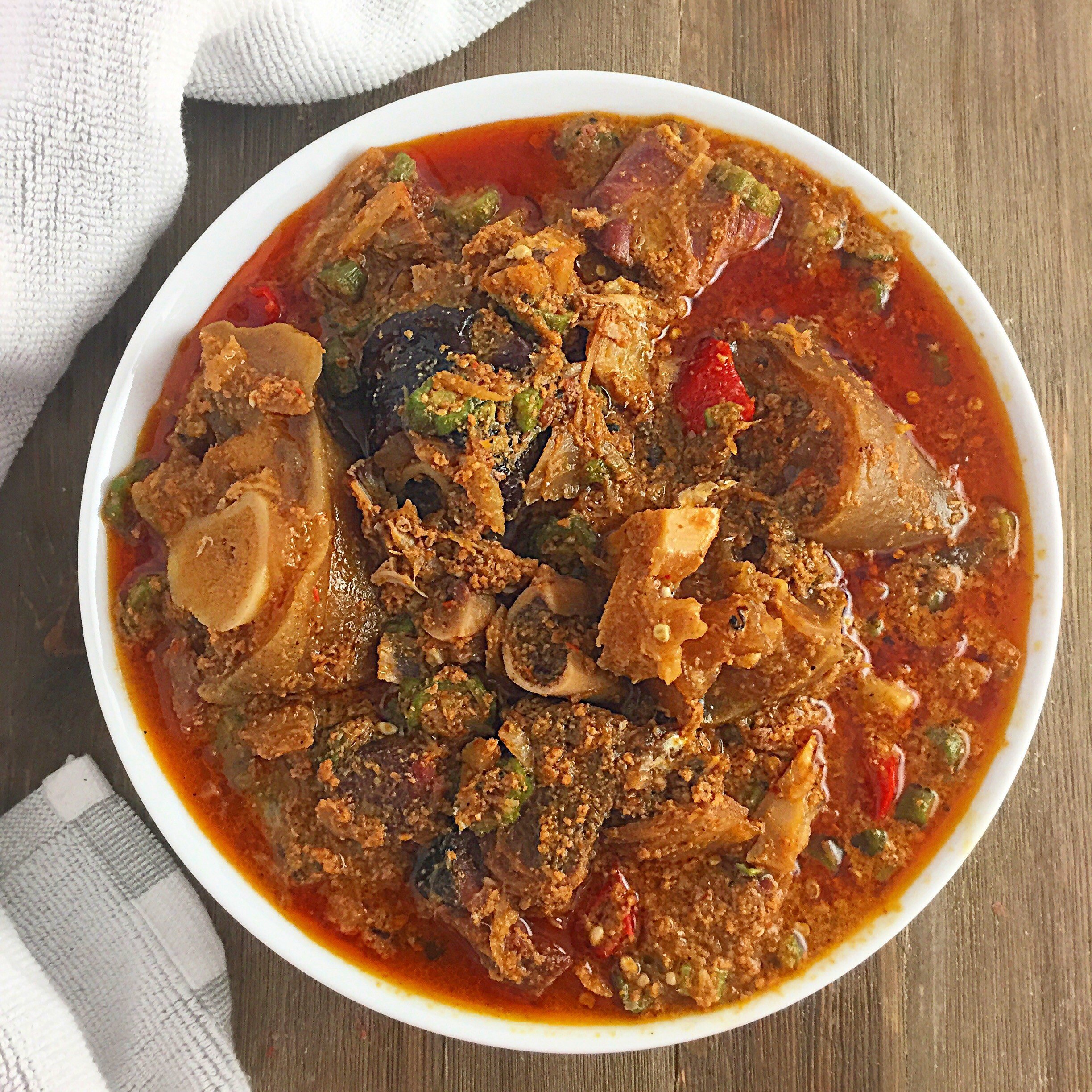 A photo of various Nigerian soups in bowls