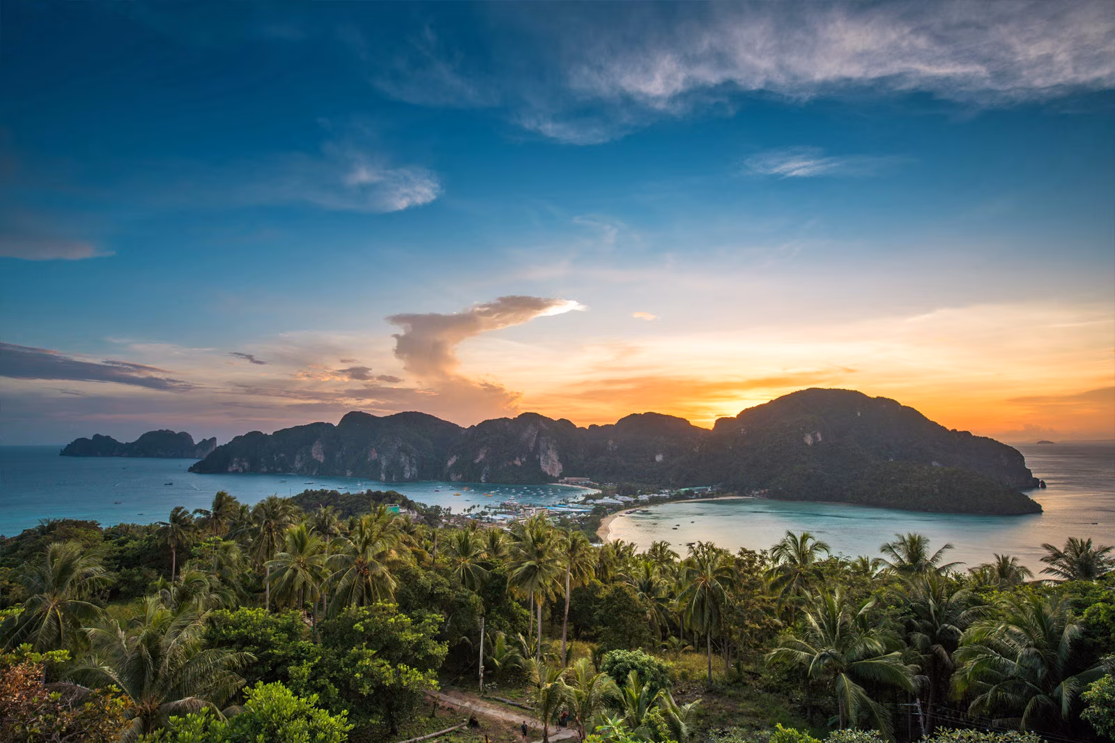 A panoramic view of the Phi Phi Islands from the viewpoint at sunset.