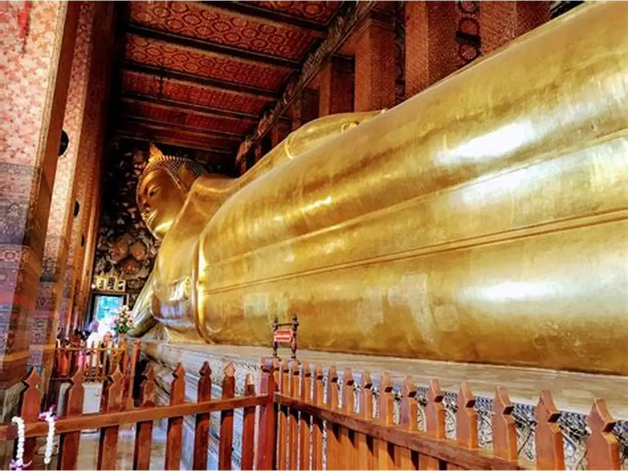 The massive, gilded statue of the Reclining Buddha inside Wat Pho.